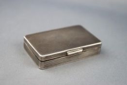 A modern silver reeded rectangular pill or snuff box, Birmingham 1971, 5cm x 3.
