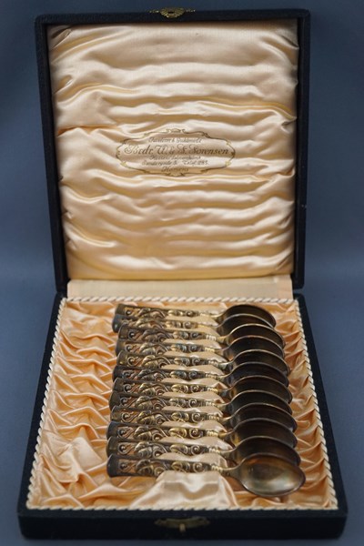 A set of twelve Danish silver-gilt coffee spoons,