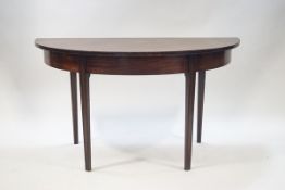 A 19th Century Mahogany demi lune side table on square taping lego, height 70.5cm, 132.