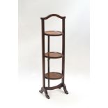 A Victorian mahogany three tier folding cake stand,