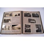 A collection of approximately two hundred private snap shots, laid down into annotated album,