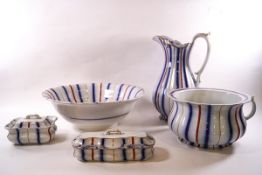 A Victorian wash set with blue, red and gilt striped decoration comprising: jug, basin,