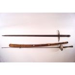 A Continental sword with scabbard, the blade 92cm long,