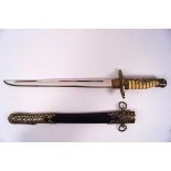 A European dress dagger and sheath with ornately decorated brass mounts and shagreen effect handle