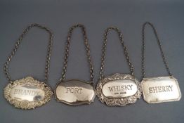 Three various silver decanter labels, 'Whisky' & 'Brandy', Birmingham 1989, and 'Sherry',