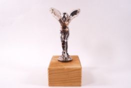 A Rolls Royce car mascot modelled as the Spirit of Ecstasy, 18cm high,