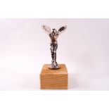 A Rolls Royce car mascot modelled as the Spirit of Ecstasy, 18cm high,