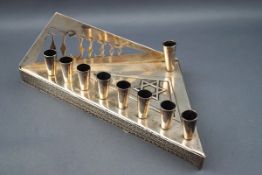 A Jewish triangular candle stand,