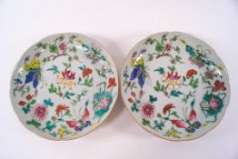 A pair of Canton enamel dishes, decorated in polychrome enamels with butterflies,