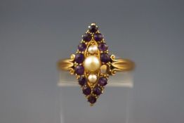 A yellow gold marquise shaped cluster ring set with graduated amethyst and seed pearls (One