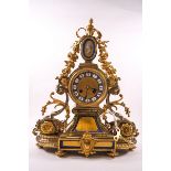 A late 19th/early 20th century French mantel clock, the eight day movement striking on a bell,