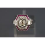 A white metal ruby and diamond dress ring.