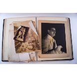 A late 18th/early 19th century large photograph album with approximately one hundred various sized