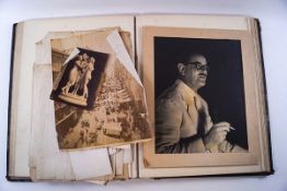 A late 18th/early 19th century large photograph album with approximately one hundred various sized