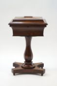 A William IV rosewood work table with caddy top on quatre form base, 78cm high x 48.