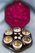 A set of six Victorian silver salts each of round tapering form with flared foot embossed with