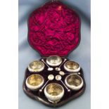 A set of six Victorian silver salts each of round tapering form with flared foot embossed with