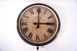 A Magneta brown bakelite electric wall clock,
