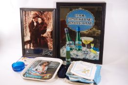 A collection of Babycham memorabilia including cloths, mirror, tray, scarf,
