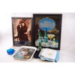 A collection of Babycham memorabilia including cloths, mirror, tray, scarf,