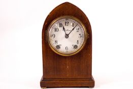 An Edwardian eight day mantel clock of lancet shape by Seth Thomas,