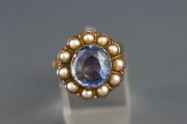 A yellow metal natural sapphire and seed pearl cluster ring. Stamped 9ct. Size: M 1/2 6.