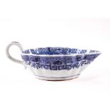 A Chinese blue and white porcelain sauce boat with scalloped shape edge,