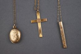 A selection of three 9ct gold pendant and chains to include locket, cross and ingot.