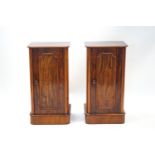 A pair of Victorian mahogany pot cupboards with panel doors, 75cm high x 39cm wide x 32.