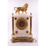 A late 19th century marble mantel clock with visible escapement,