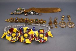 A small quantity of costume and other jewellery to include a gilt gem set panel bracelet with