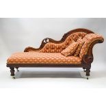 A Victorian mahogany show frame chaise longue with button back,