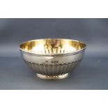 A silver sugar bowl by George Adams, the round body part fluted on a short slightly flared foot,