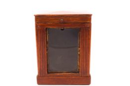 A wooden carriage clock case with green baize lining, 14.