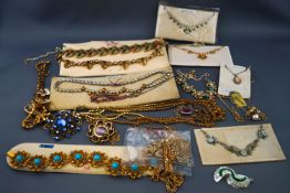 A selection of twenty base metal costume necklaces set with paste stones,