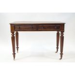 A 19th century mahogany two drawer side table on gadrooned legs and ceramic casters,