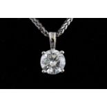 A white metal single stone diamond pendant. Stated to be 0.74ct.