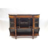 A Victorian rosewood credenza with bow fronted side cabinets,