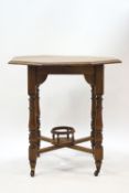 A Victorian oak octagonal occasional table with undershelf on turned legs joined by an X-frame