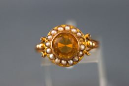 A yellow metal, citrine and seed pearl (one missing) cluster ring.