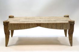 A 20th century Italian marble coffee table on composite legs bearing Classical swag detail,