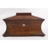 An early Victorian rosewood tea caddy of sarcophagus form with two lidded compartments and later