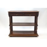 A 19th century French oak buffet with a hinged inset marble top over two drawers with gilt metal