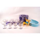 A collection of Babycham memorabilia including eight glasses, bottle collar, ashtray,