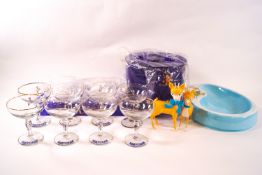 A collection of Babycham memorabilia including eight glasses, bottle collar, ashtray,