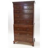 A 20th century walnut chest on chest,