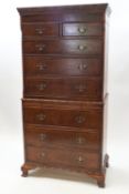 A 20th century walnut chest on chest,