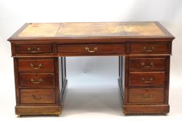 An Edwardian mahogany pedestal desk,