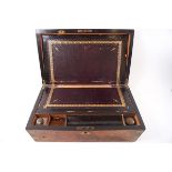 A Victorian burr walnut brass bound writing slope with purple leather inset surface and two glass