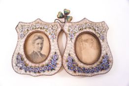 A Victorian micro-mosaic double photograph frame, with clover crest and two shield shaped frames,